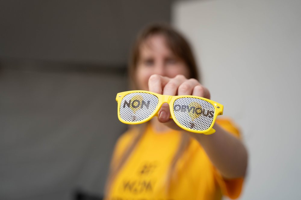 A pair of the yellow Non-Obvious glasses