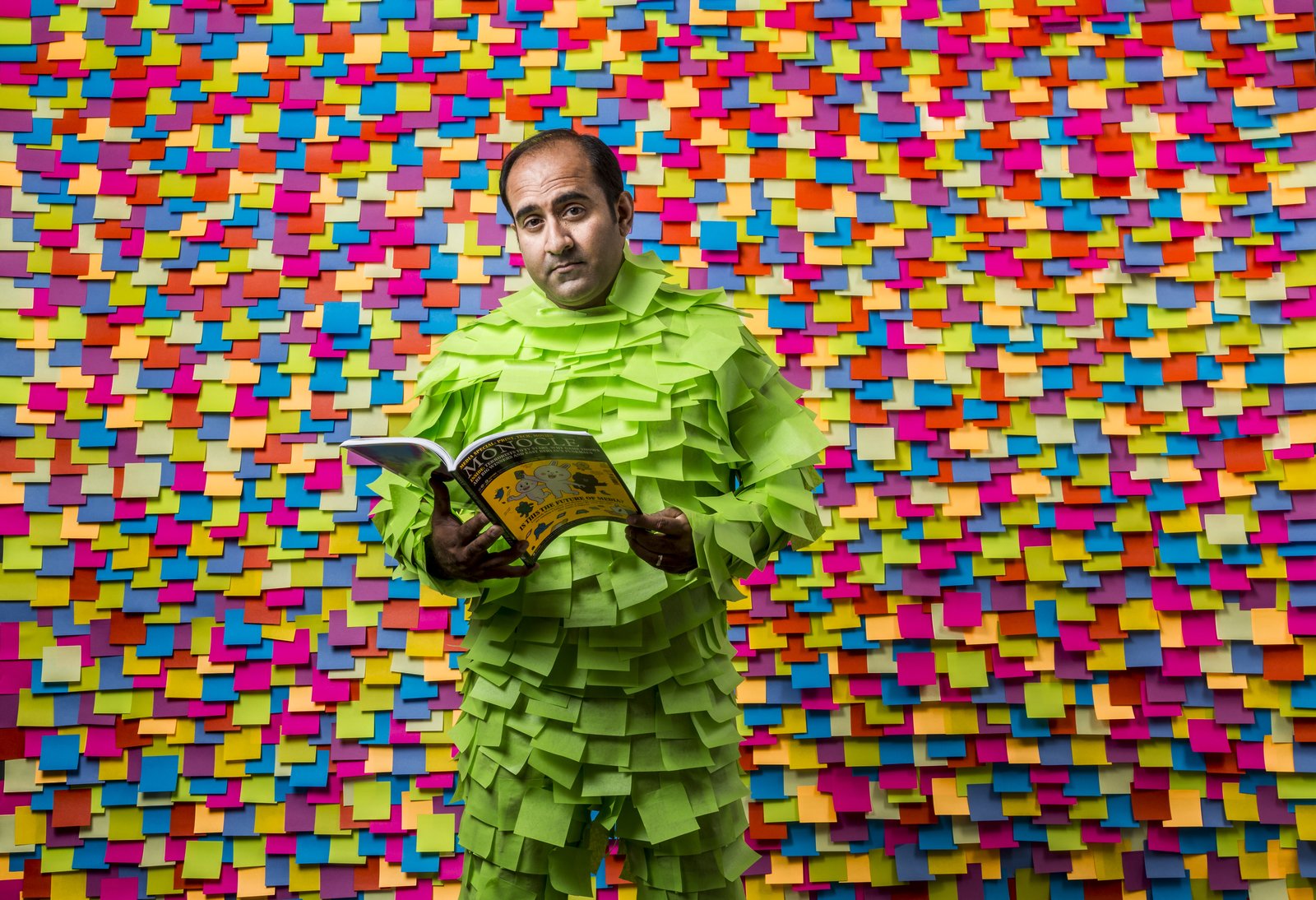 Rohit in a suit made entirely of Post-it Notes