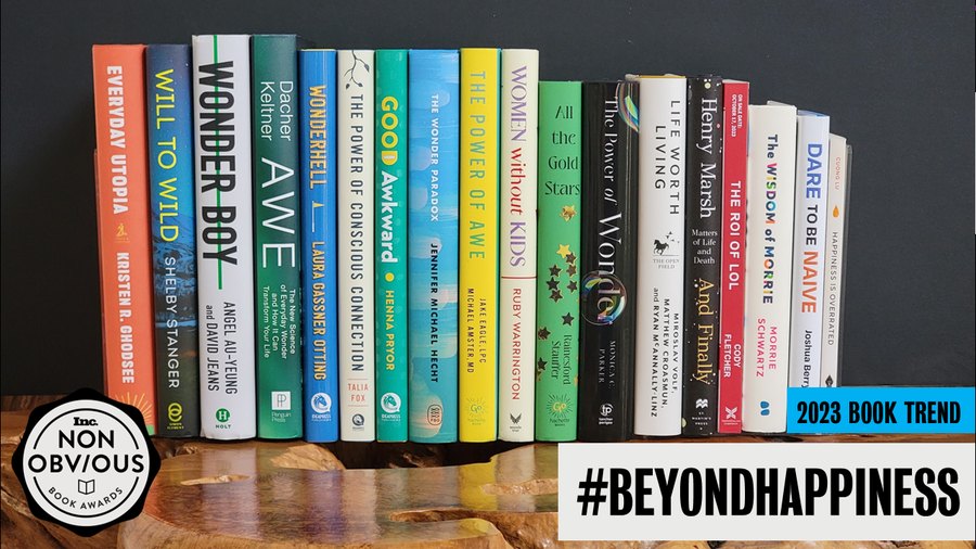 The books behind the #BeyondHappiness trend — a stack of 2023 longlist titles