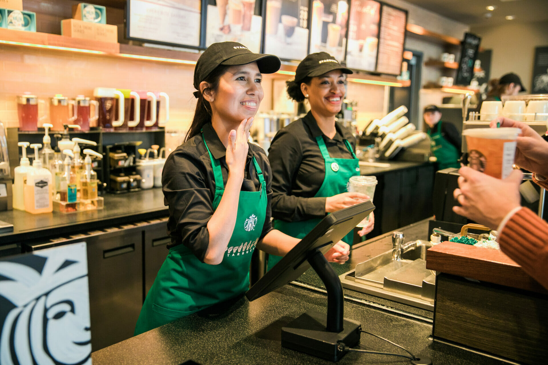 Partners take an order on Monday, October 22, 2018 at Starbucks first U.S. Signing Store in Washington D.C. (Joshua Trujillo, Starbucks)